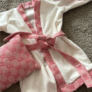 designer robe for a baby girl 0-6 months only worn for a couple hours.